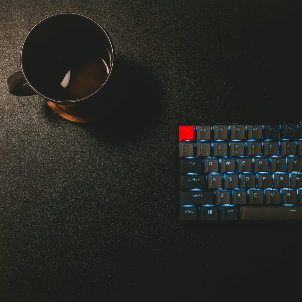 keyboard and coffee mug